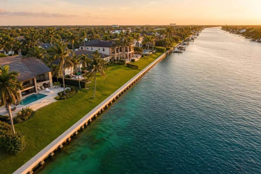 Aerial view of seawall-protected waterfront homes in Florida