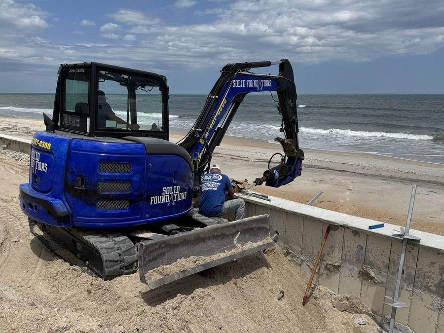 Solid Foundations branded truck — Florida seawall repair specialists