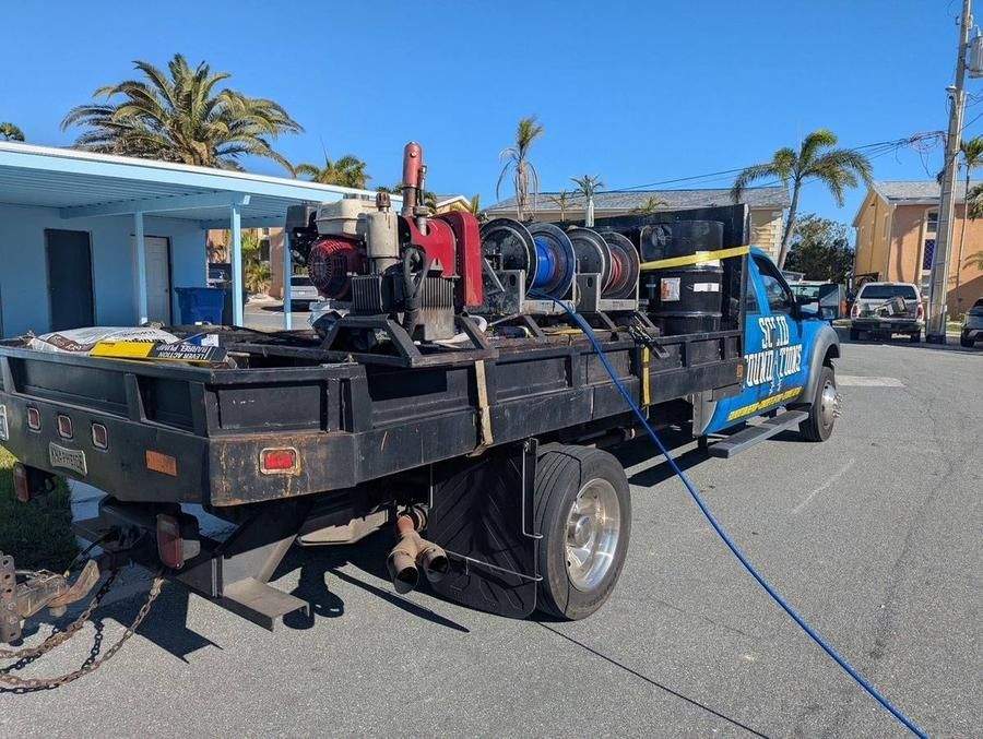 Polyurethane injection stabilization — night crew seawall project